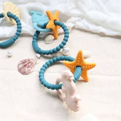 খাদ্য গ্রেড সিলিকন বেবি Teether সঙ্গে অ-বিষাক্ত নকশা এবং সহজ হ্যান্ডেল হ্যান্ডেল BPA মুক্ত সিলিকন Teething রিং